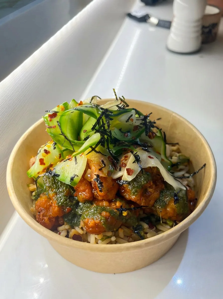 Spiced rice bowl with nori and pickled ginger