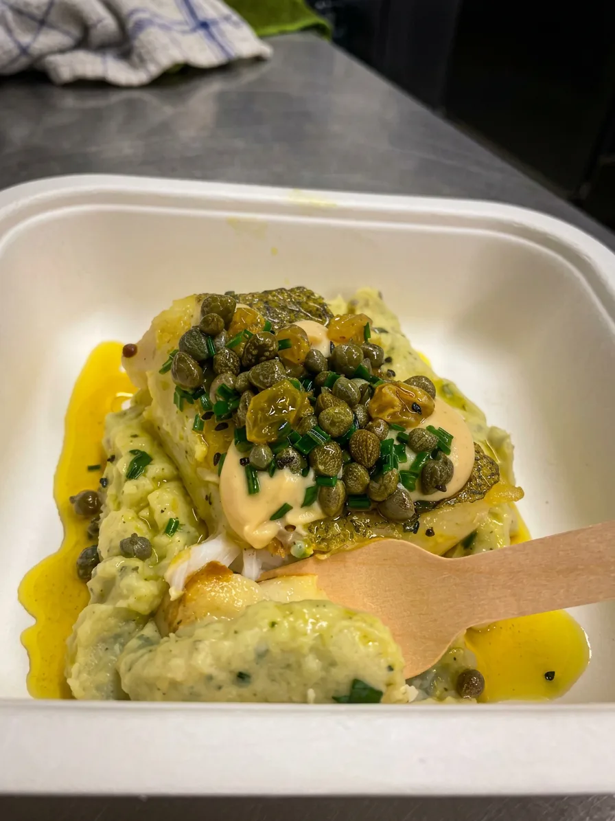 Pan-fried fish with capers, sultanas and herb mash